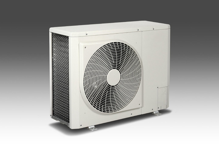 HVAC technician outdoor unit repair